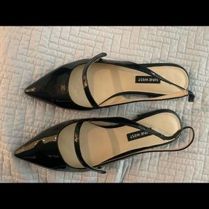 Nine West black shiny.  Size 8. Never worn. Sling back. Slight heel.